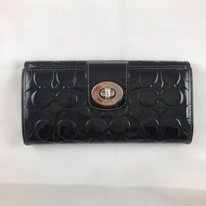Coach embossed leather wallet black